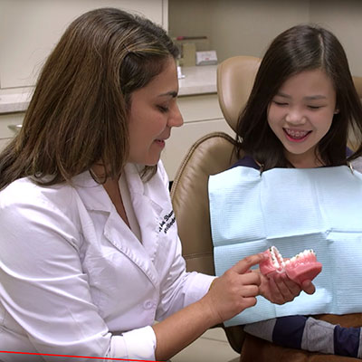 Doctor explaining dental procedure to patient